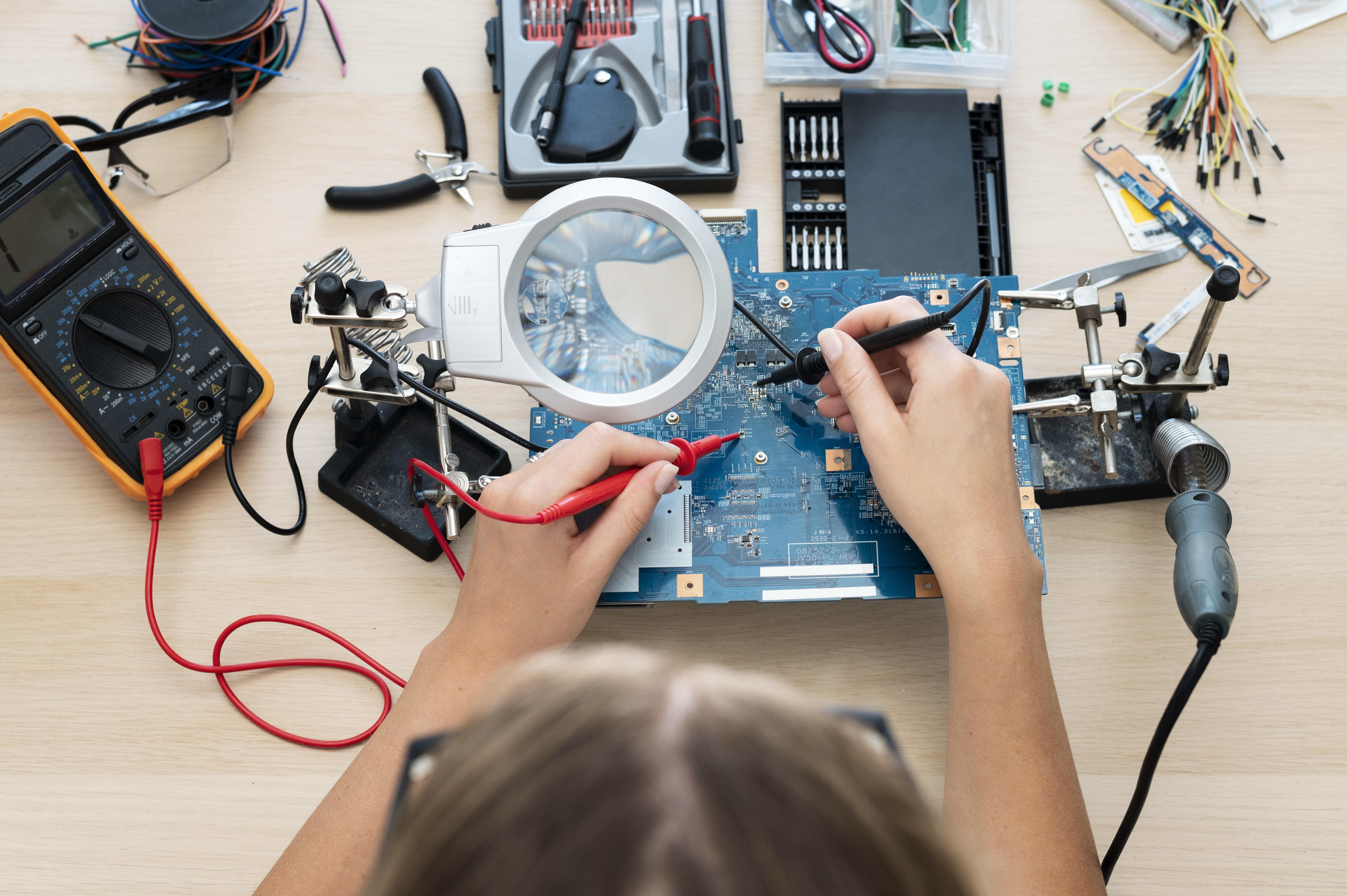 Young inventor building in a workshop